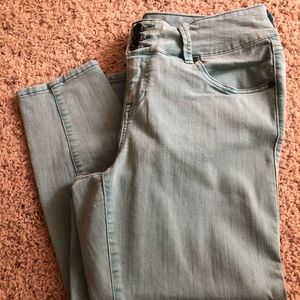 Torrid denim, color is light teal/turquoise